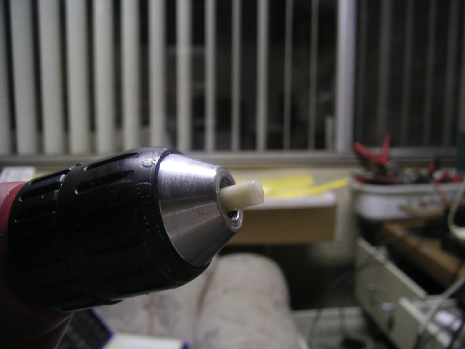 Wax candle in a drill