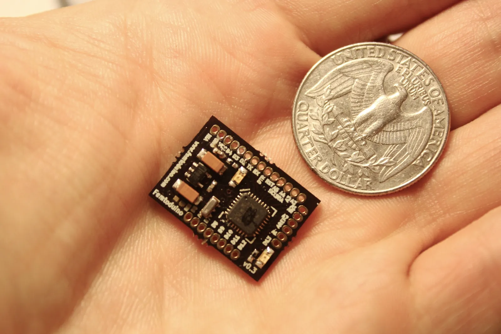 Femtoduino coin size comparison